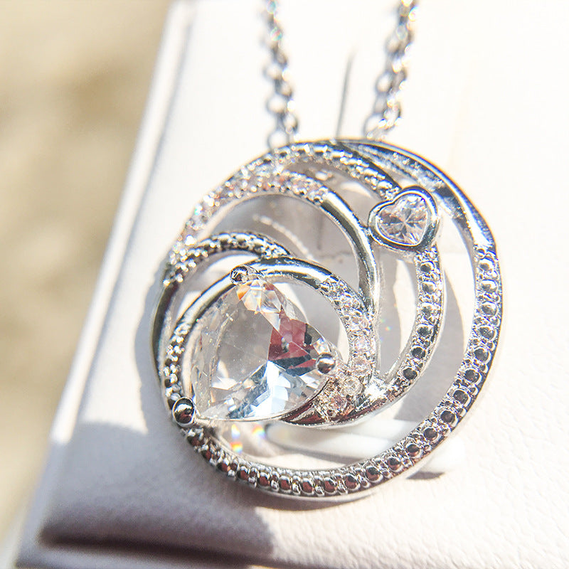 Round Eight Hearts and Eight Arrows Zircon Pendant