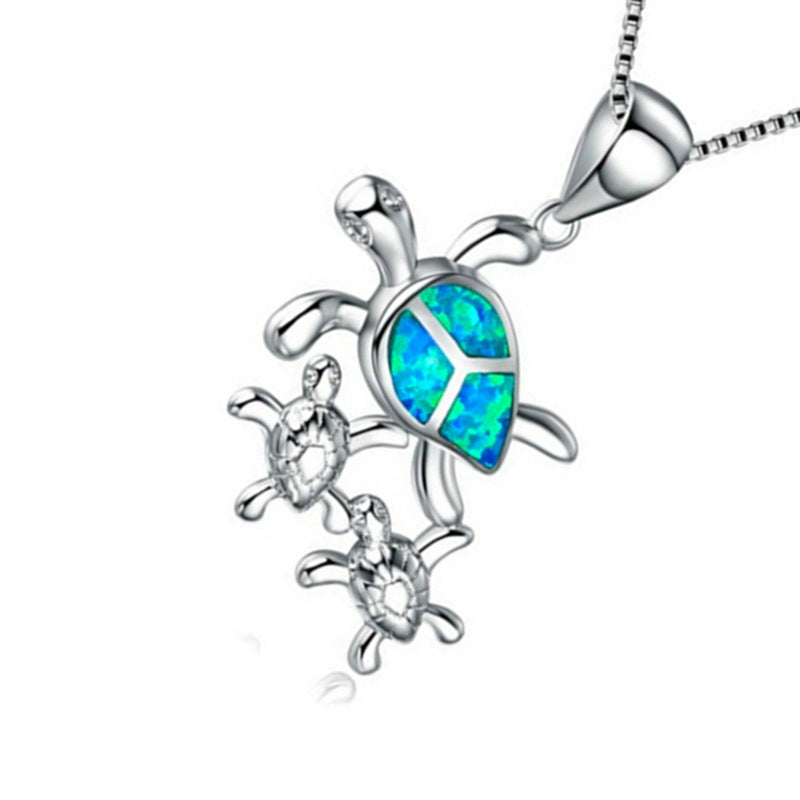 Fashionable Silver Pendant with Three Opal Tortoises