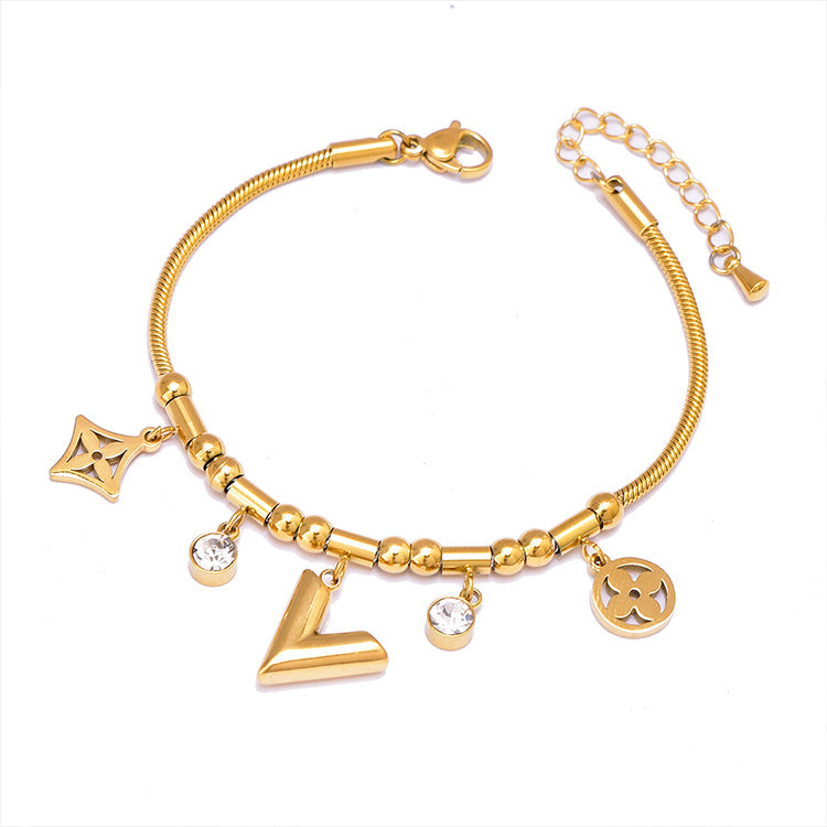 Colorful Geometric Snake Bone Bracelet with Bear & Charms