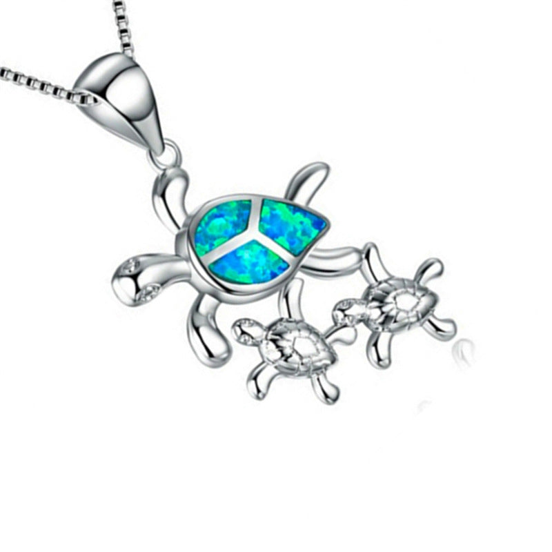Fashionable Silver Pendant with Three Opal Tortoises
