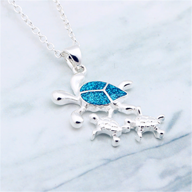 Fashionable Silver Pendant with Three Opal Tortoises