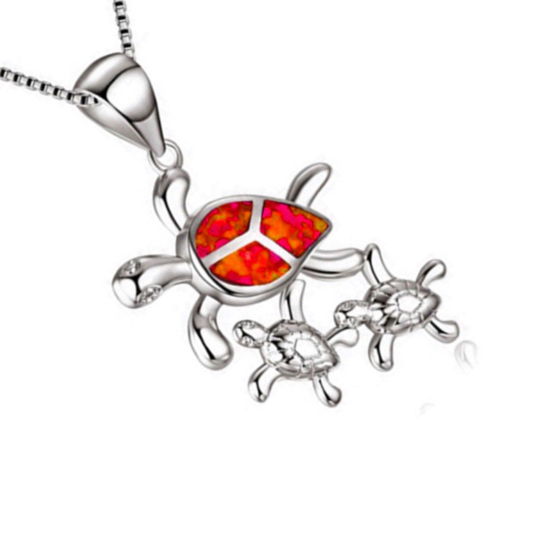 Fashionable Silver Pendant with Three Opal Tortoises