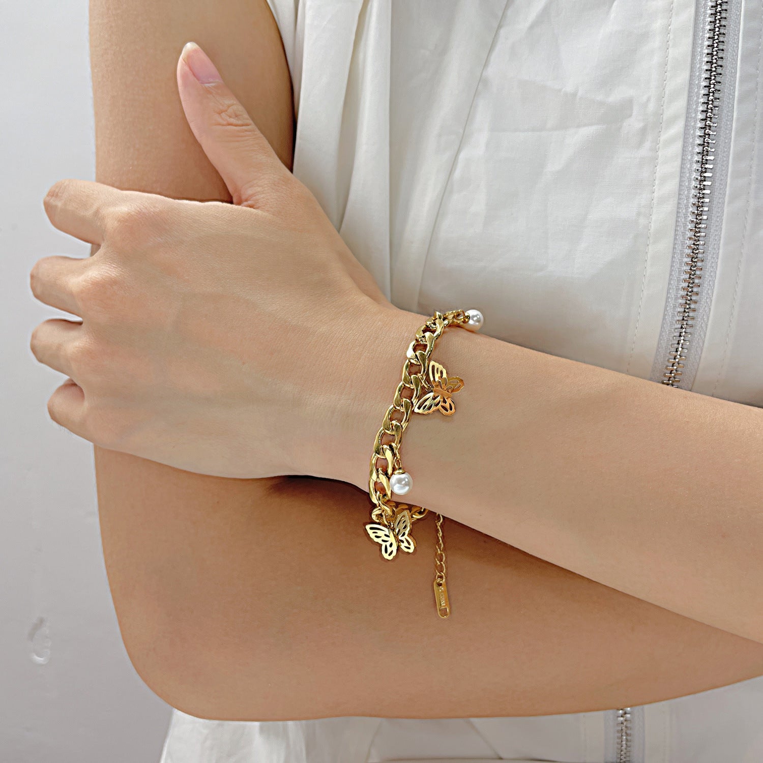Titanium Steel Bracelet with Pearl Butterfly Design